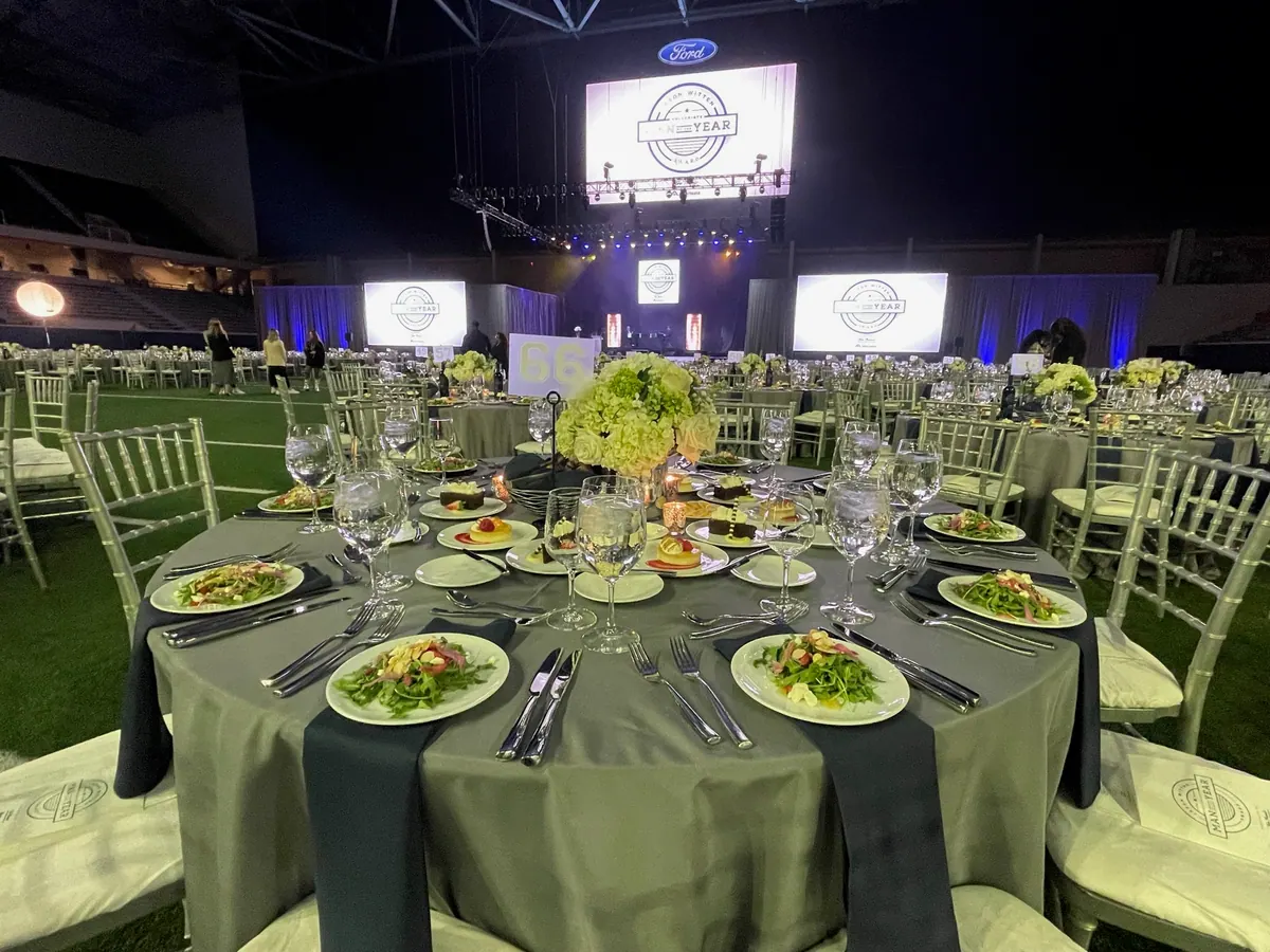 Table setting with the stage behind, Ford Center at The Star