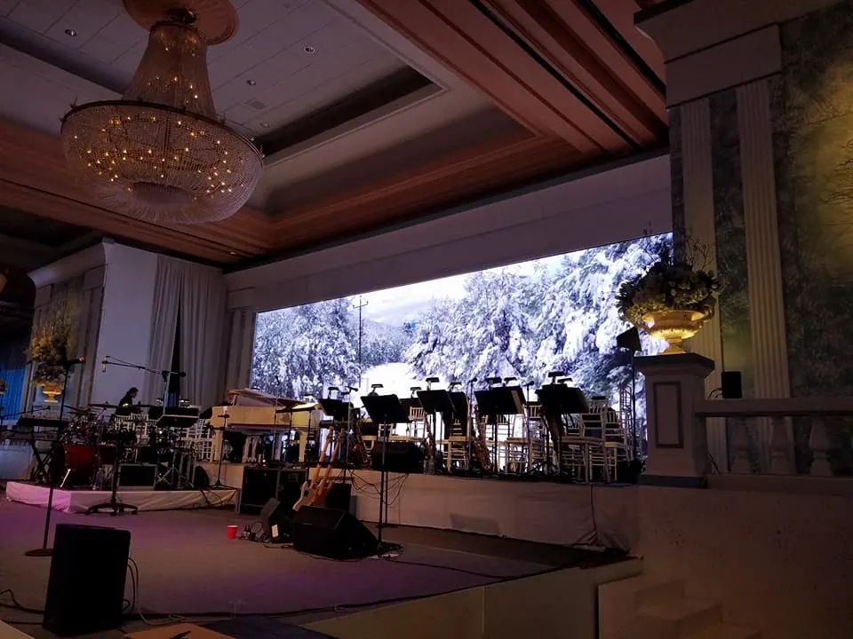 Orchestra in front of a ballroom LED wall