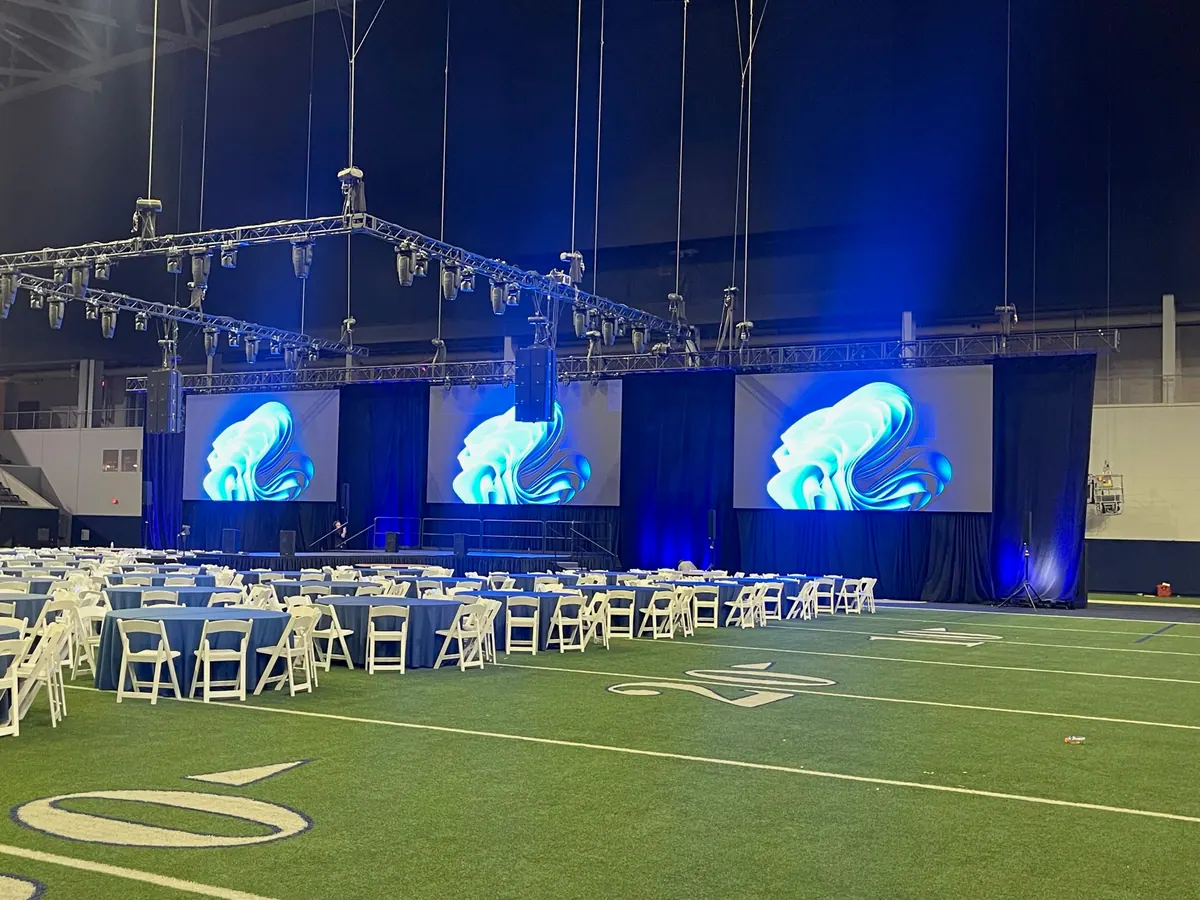 Flown truss and screens over the field, Ford Center at The Star